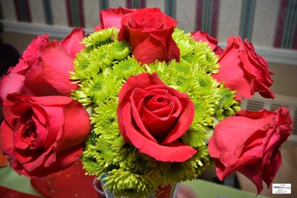 Centerpiece of bridal head table.  No one believed a nice Spring green and a rose red would go together so beautifully!