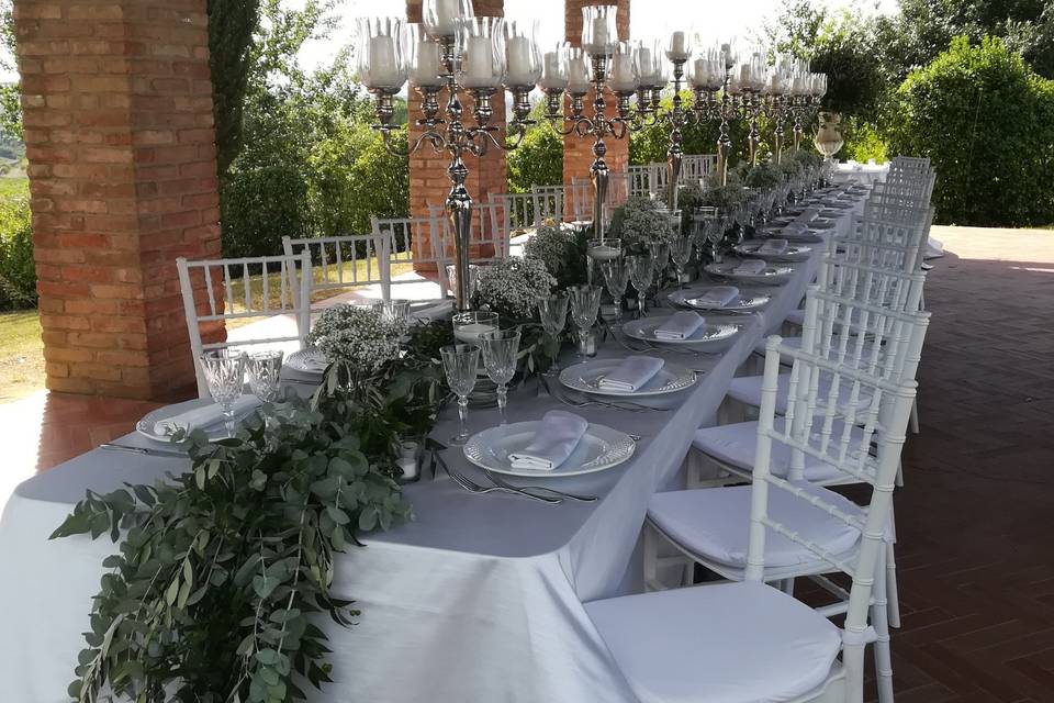Candelabras and greenery