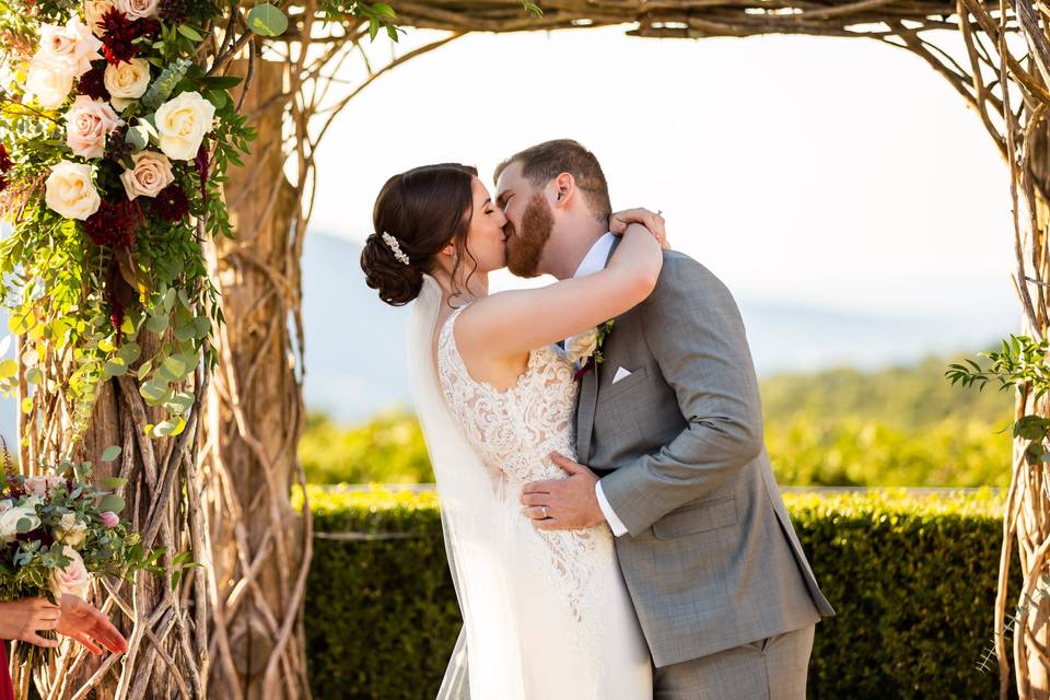 Bride and groom kissing