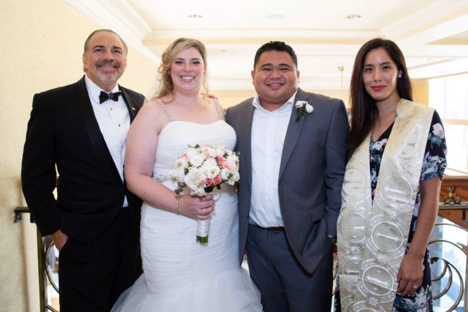Newlyweds with the officiants