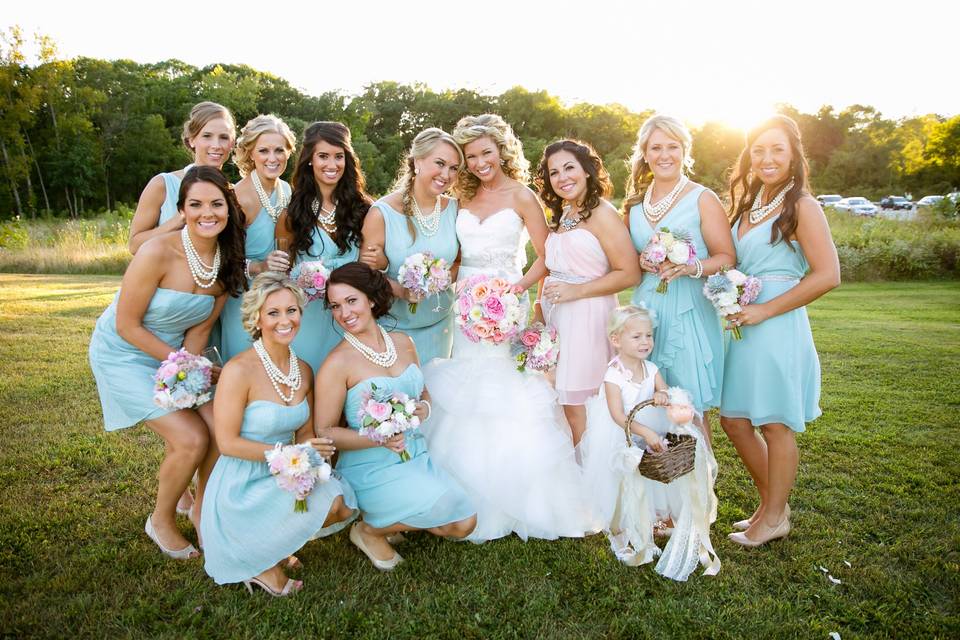 Bride with bridesmaids and flower girl