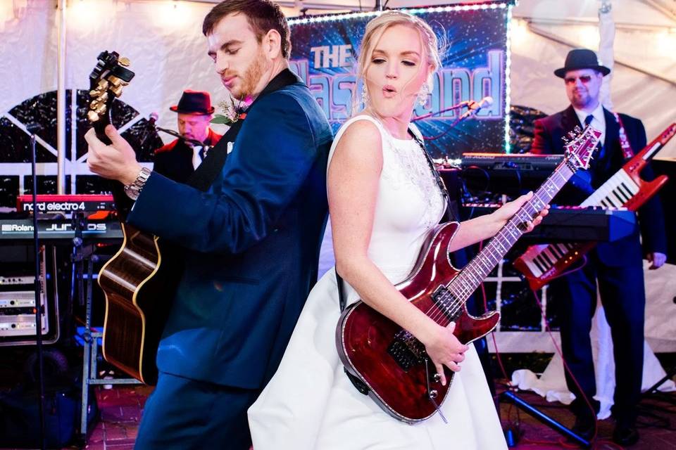 Bride performing with band
