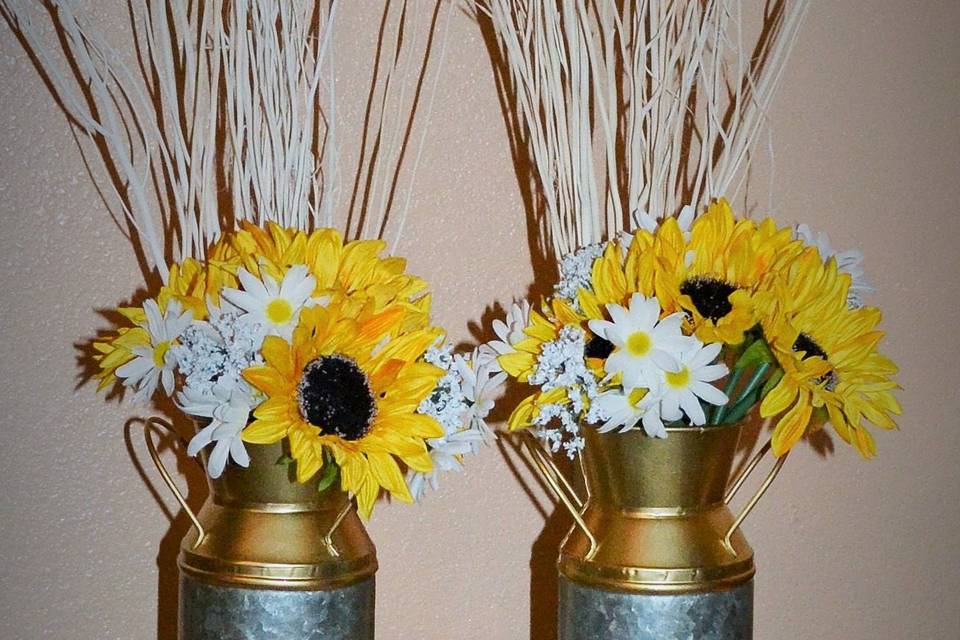 Sun flowers in milk cans
