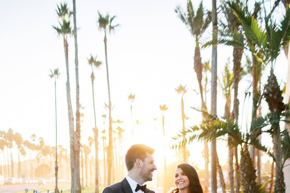 Bride and groom enjoy sunset