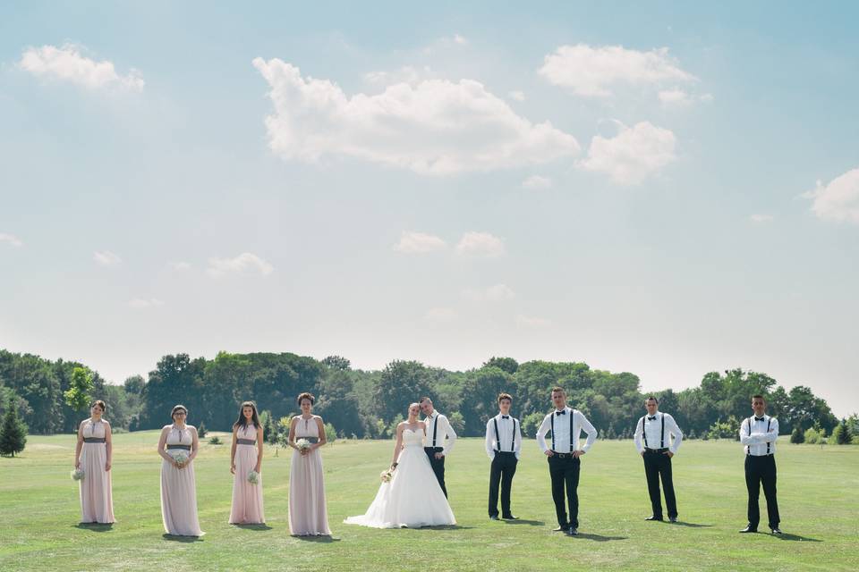 Wedding couple with guests