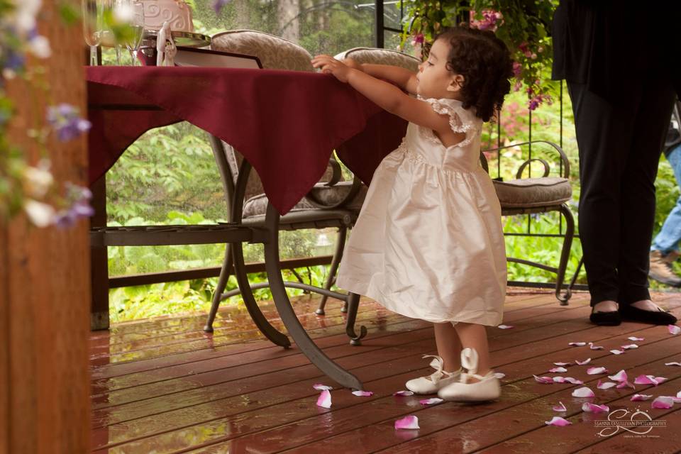 Flower girl at garden wedding