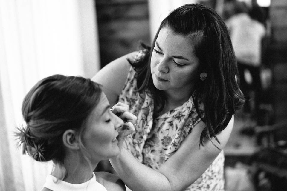 Bride getting makeup done