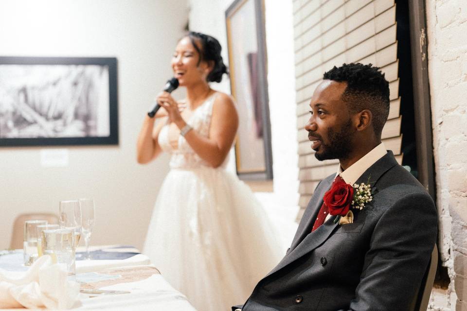 Bride gives toast to groom