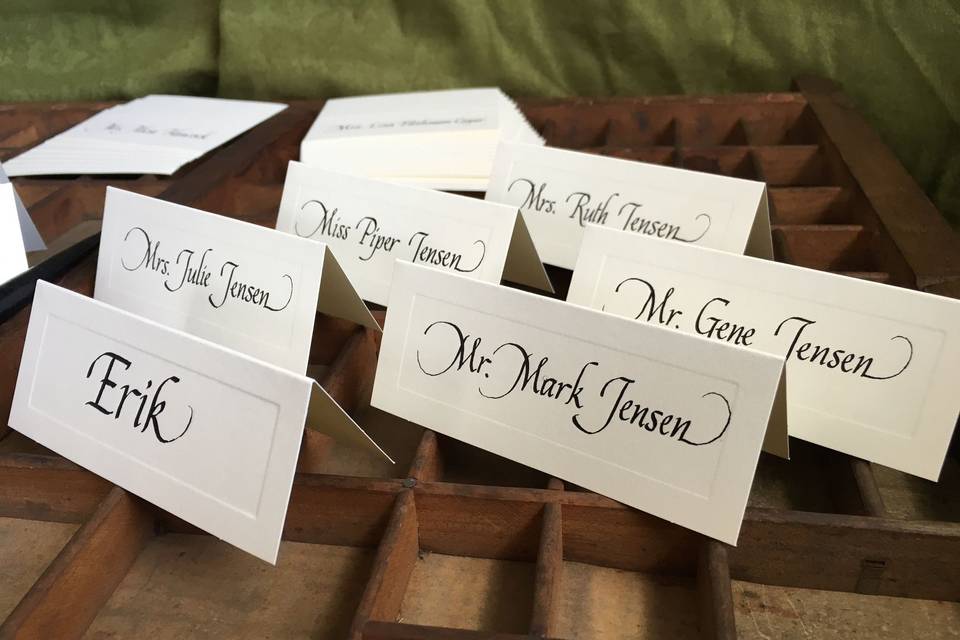 Place cards and escort cards may be lettered with custom inks. #placecards #escortcards #calligraphy #italic #rusticwedding #weddingcalligraphy