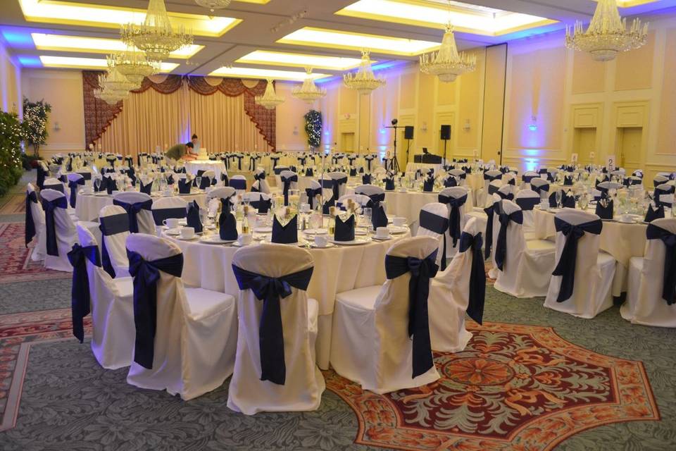 Ivory Banquet Chair Covers & Navy Blue Satin Sashes