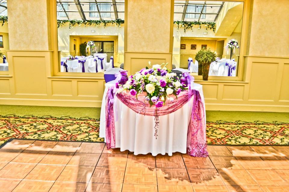 White Banquet Chair Covers & Purple Satin Sashes