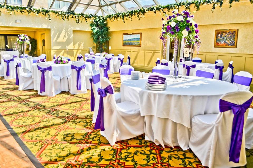 White Banquet Chair Covers & Purple Satin Sashes