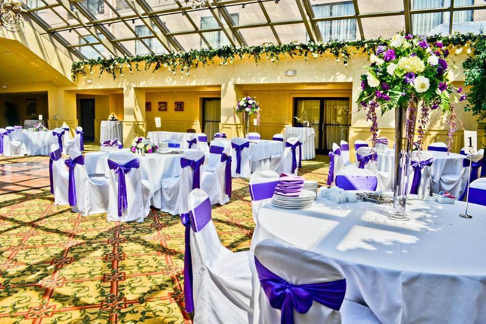 White Banquet Chair Covers & Purple Satin Sashes