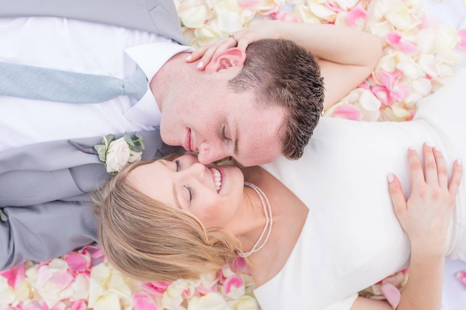 Jenna & Kyle in a bed of roses