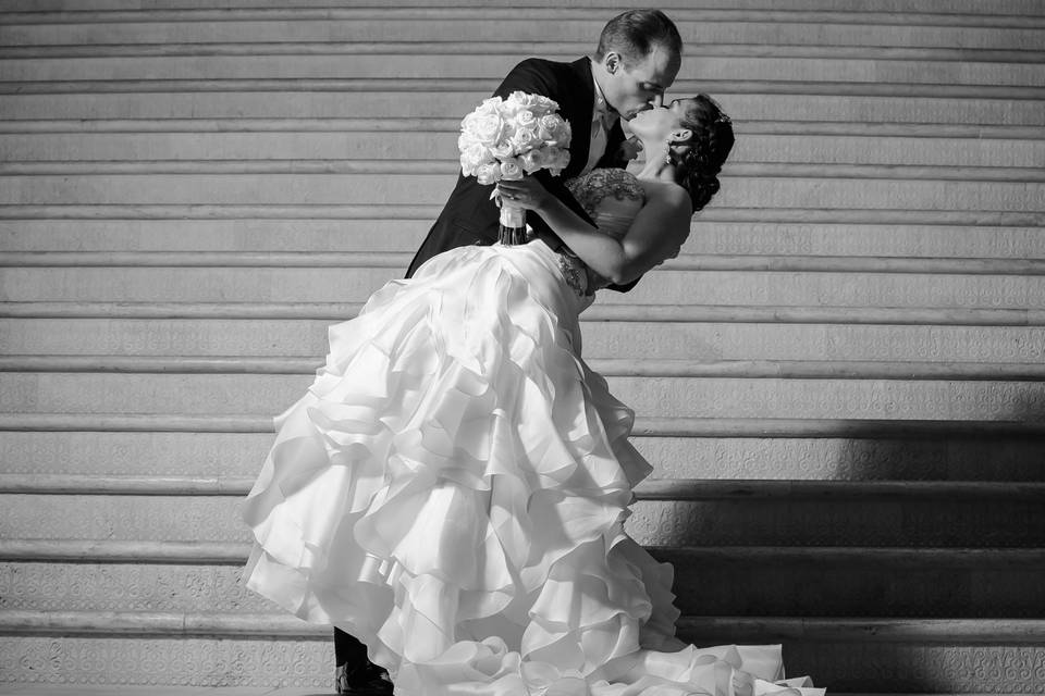 Bride & groom on the Eilan's breathtaking signature entry staircase