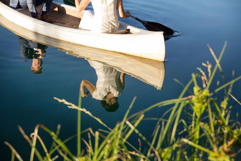 Bride and groom in canoe