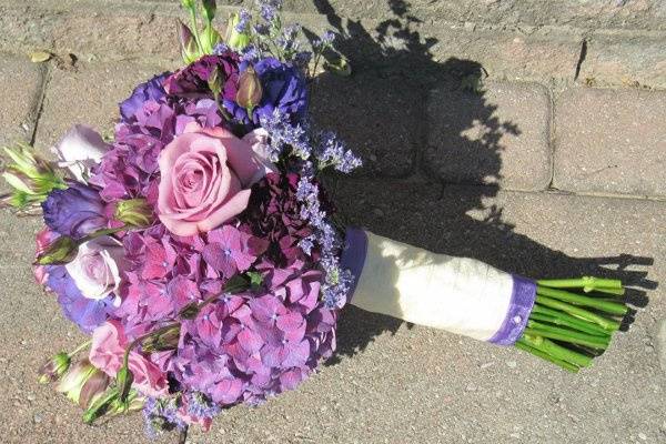 Purple Hydrangea, Lavender Roses, Purple Lisianthus, Ocean Spray Roses and Limonium.