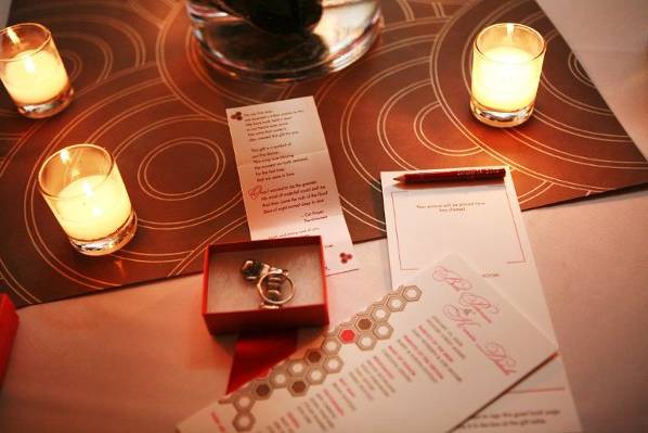 beth and kevin's custom made favor by f is for frank displayed with the invitation