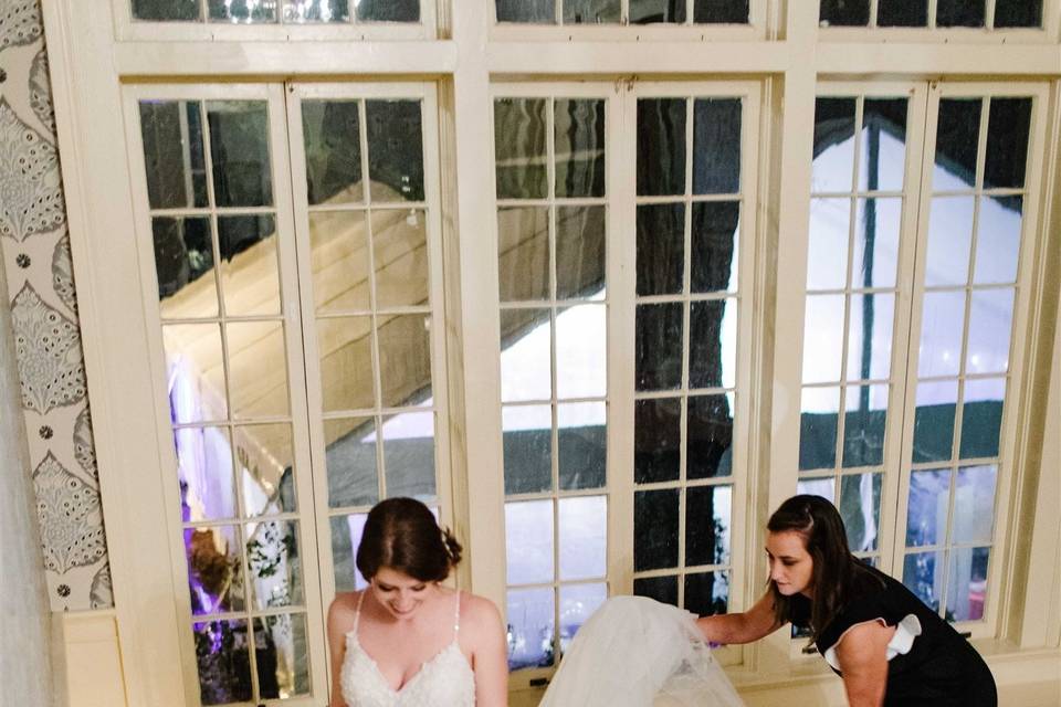 Owner Helping Bride