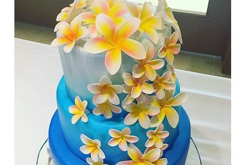 Ombre blue cake with yellow flowers