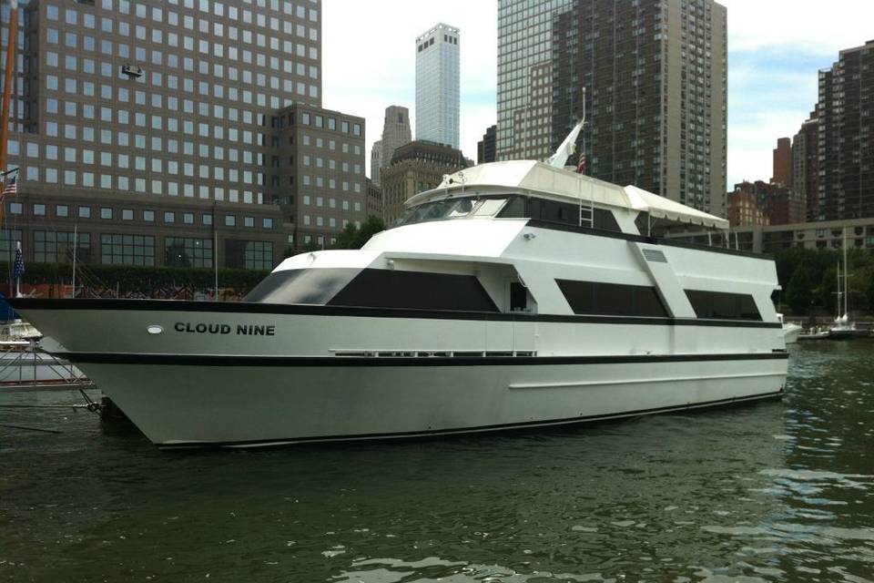 Cloud Nine III - has a beautiful two deck layout with dinning room, full-bar, dance floor, galley, and private bridal suite. Hosts up to 75 guest, the Cloud Nine III is ideal for an intimate wedding.