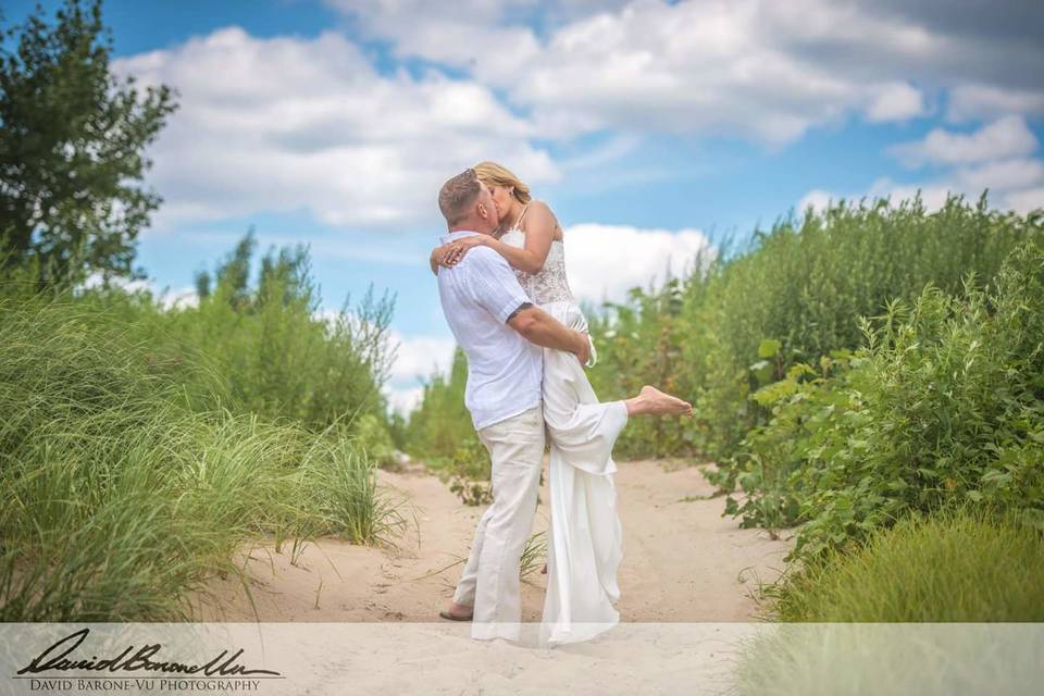 Groom kisses his bride