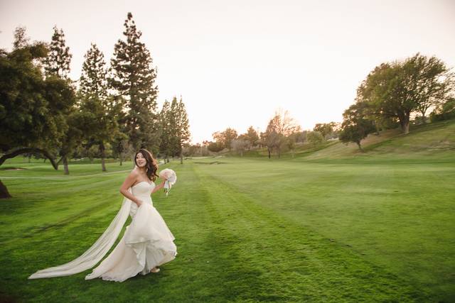 Bride running around the course