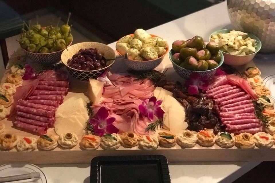 Mediterranean Charcuterie~Variety of meats & cheeses, hummus coins, stuffed peppers