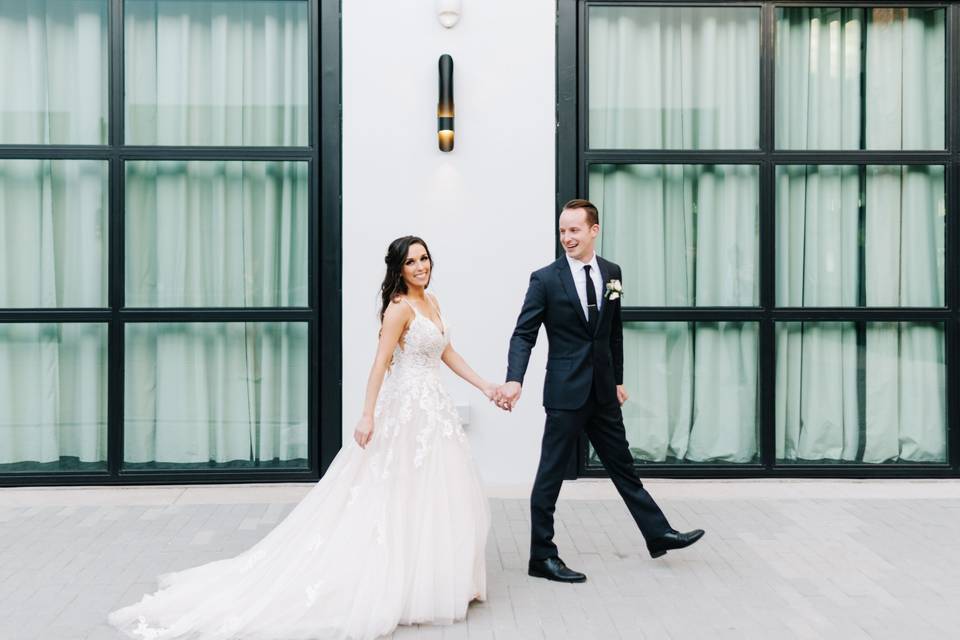 Couple leisurely walk hand in hand