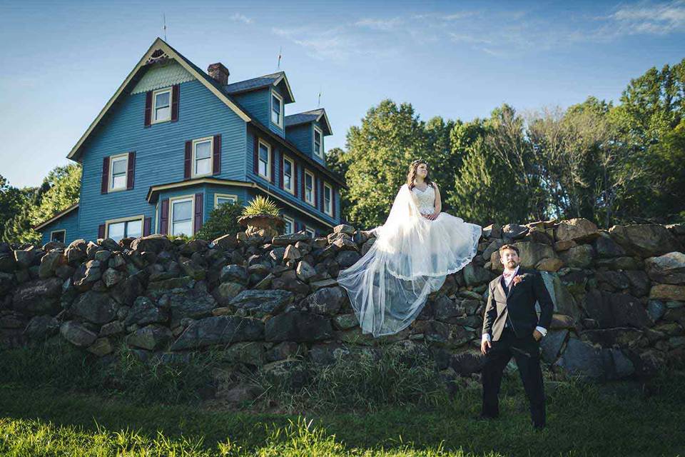 Bride poses on wall