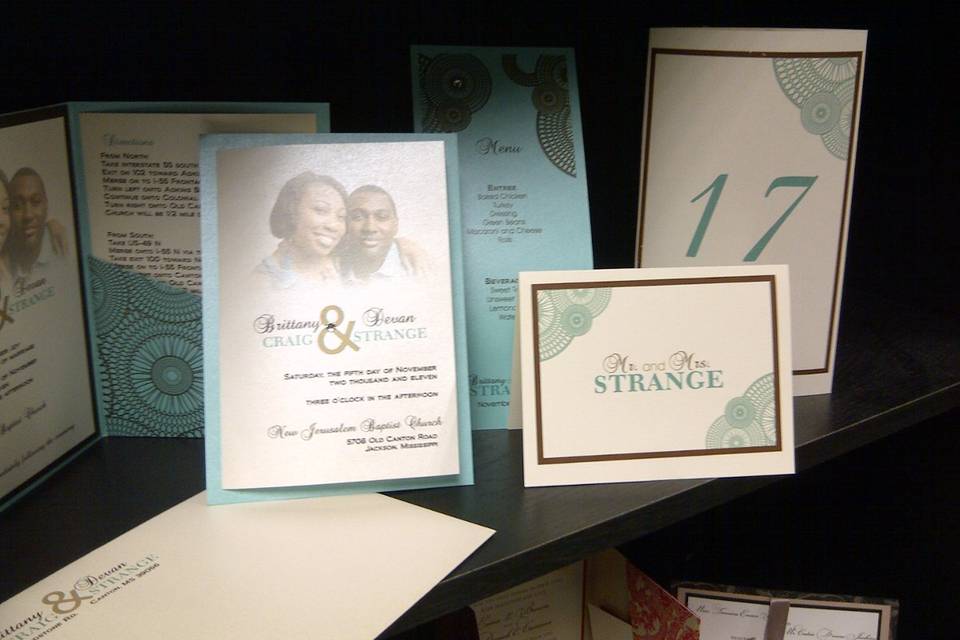 5x7 folded program with layered backing, custom table number, 4x9 menu card, and personalized note card.