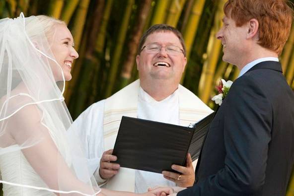 Couple with officiant