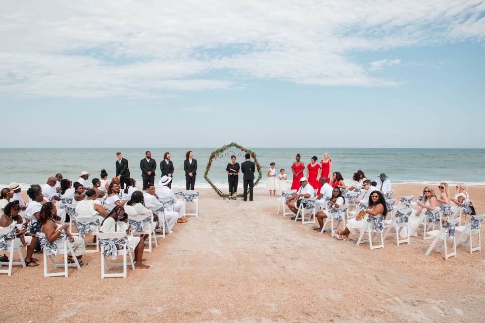 GUESTS IN WHITE BRIDE IN BLACK