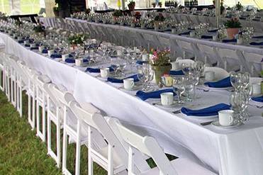 White resin chairs w/ table