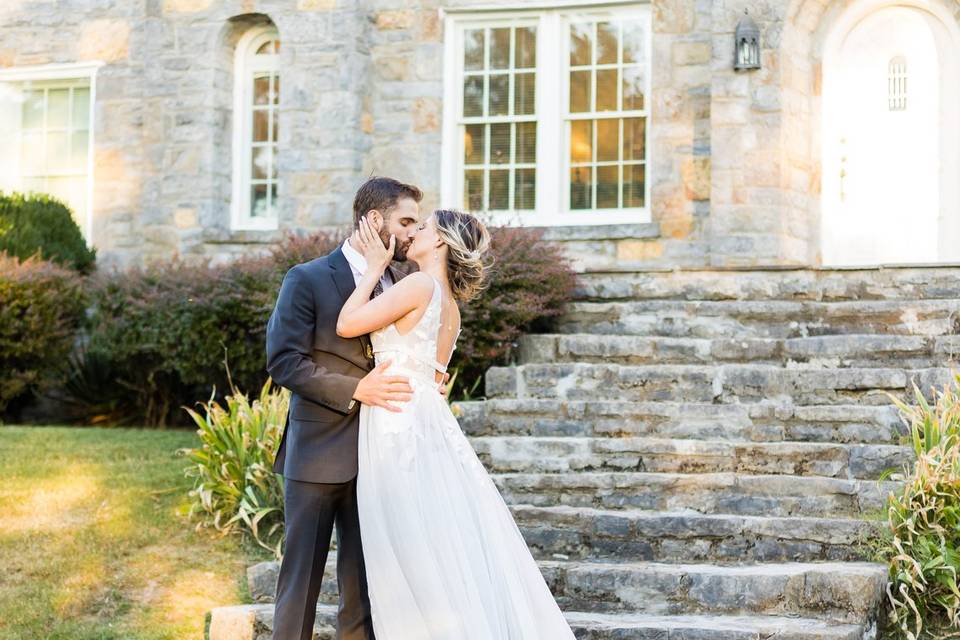 Bride and groom kissing