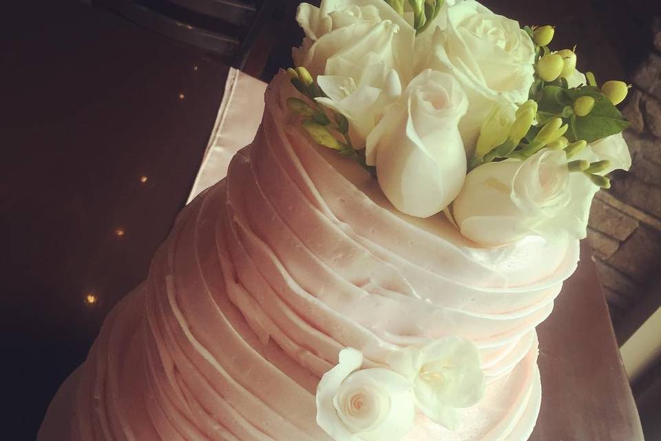 Beautiful ruffle cake... all buttercream! If you love the look of fondant and not the taste, look at what we can do for you!
