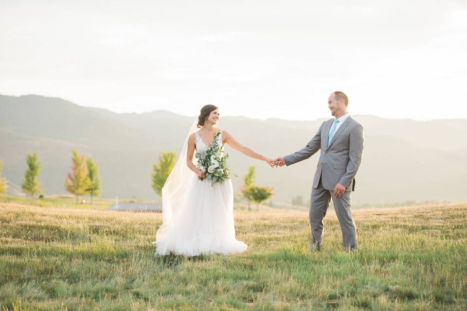 Newlyweds in a field