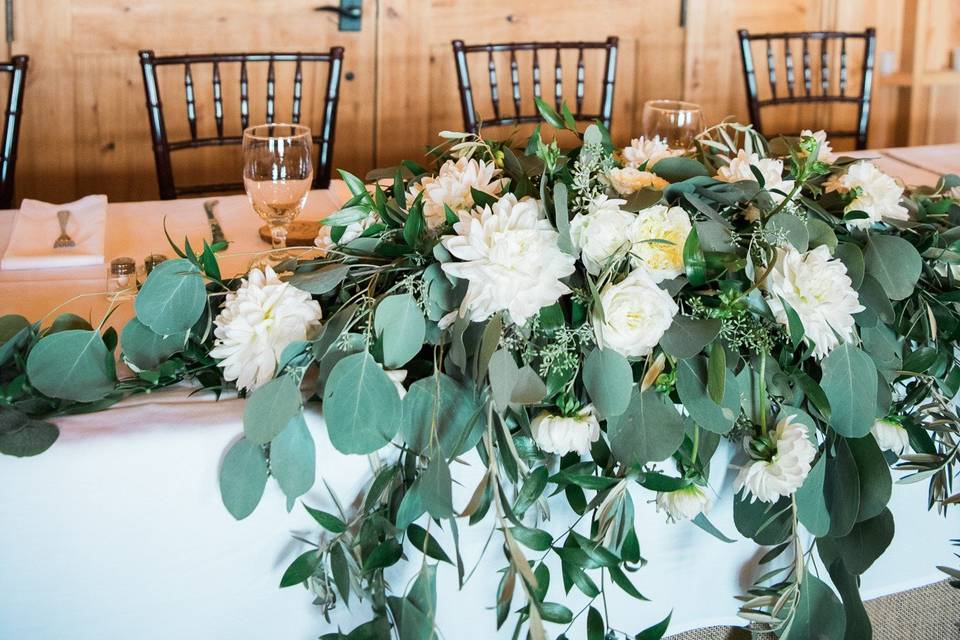 Sweetheart table with flowers