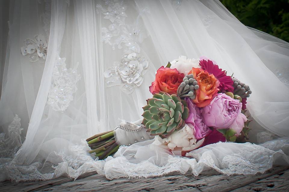 Bouquet by the bride's feet