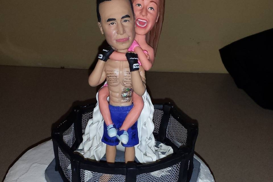 Custom wedding cake topper - Love this!  Edwin is an MMA fighter.  Create one that shows your style.