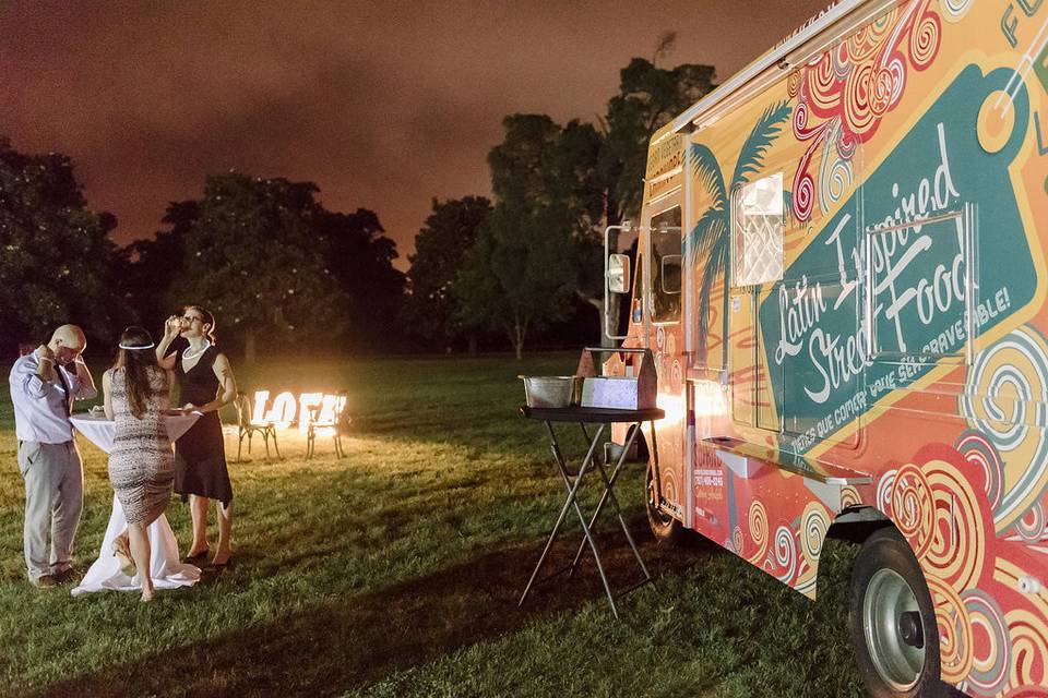 Cocktail tables and food truck