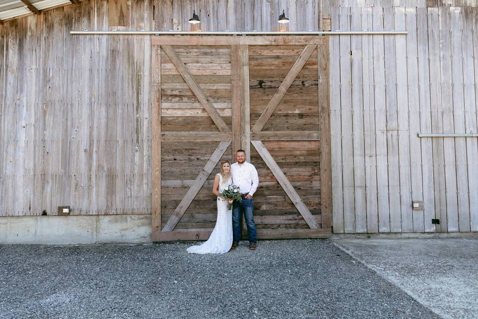 Bride and groom barn doors