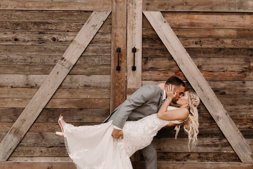 Bride and groom barn doors