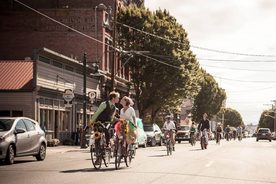 Post ceremony bike ride down main street Port Townsend, Wa.