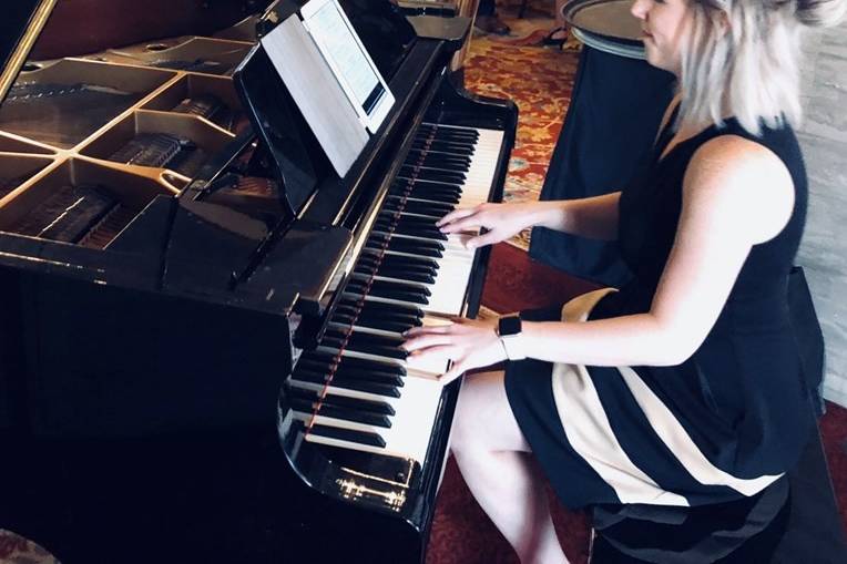 Courtney playing piano