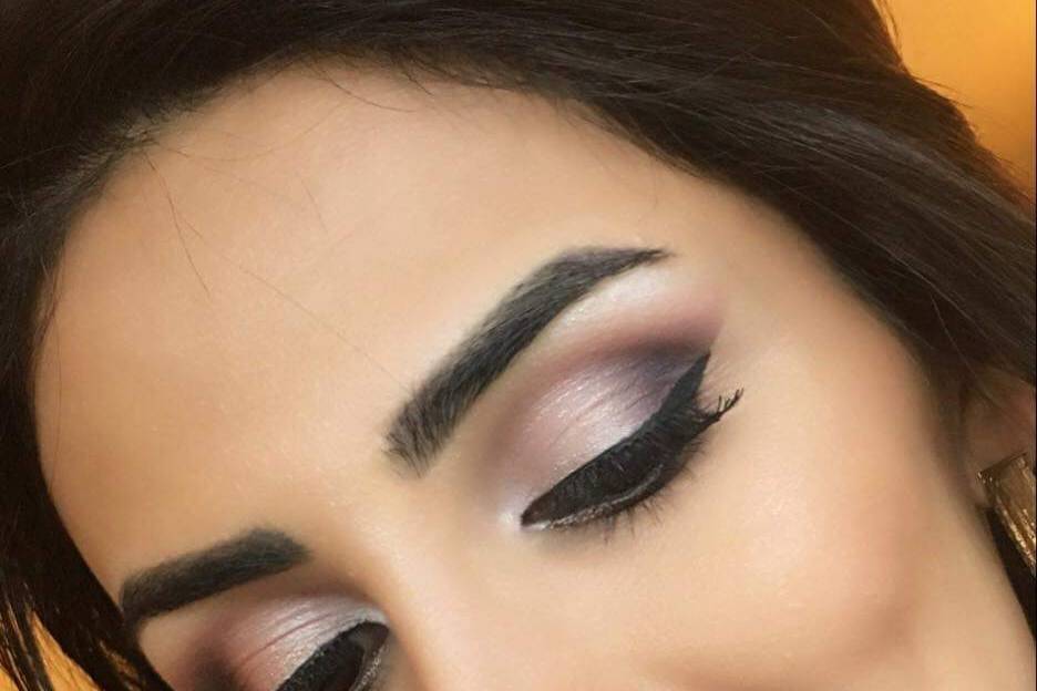 Shimmery smokey eye with pink lip