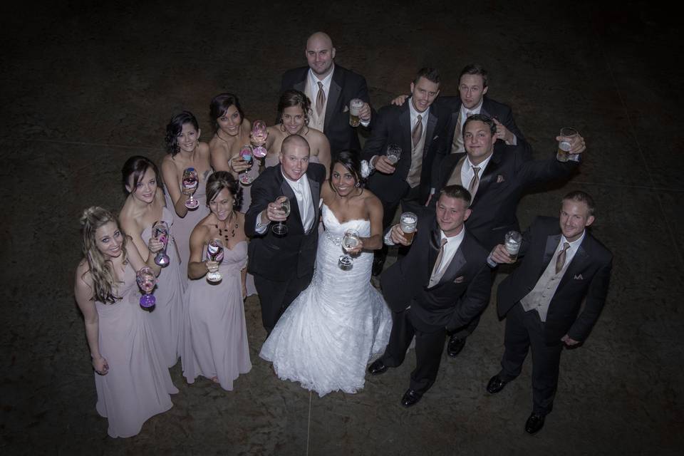 The couple with the bridesmaids and groomsmen