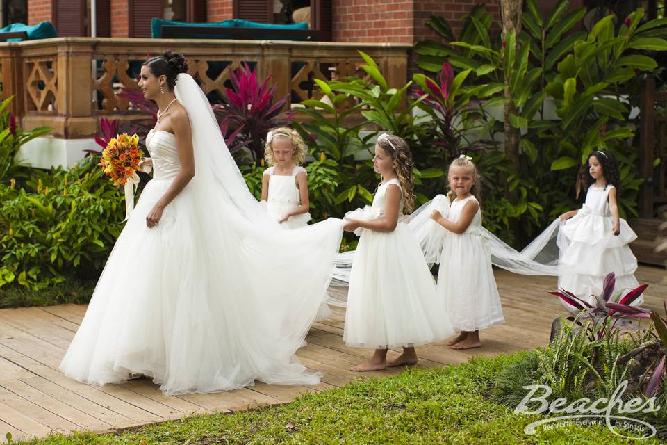 Little girls assisting the bride