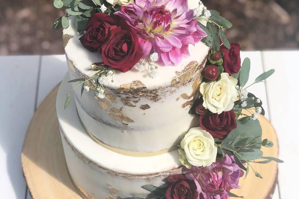 Naked cake cascading flowers