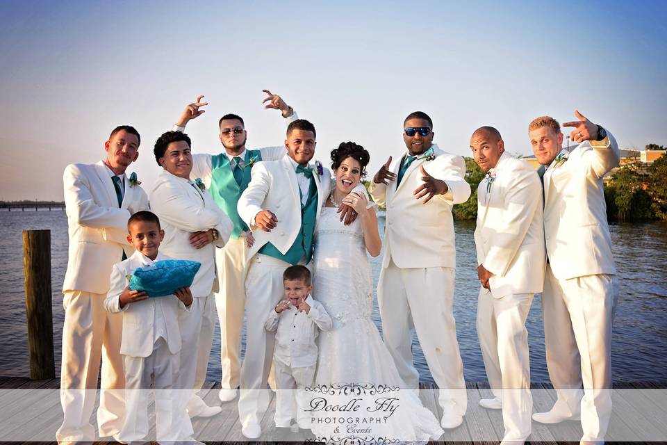 Fun Wedding Party Portrait captured by Doodle Fly Photography at White Orchid at Oasis Fort Myers Florida